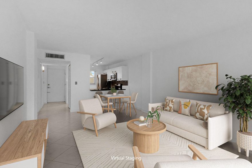 Discover this tastefully renovated condo in popular Royal Park where canal views offer a serene backdrop for your life. The heart of the home is the open-concept kitchen, featuring newer cabinetry, sleek quartz countertops, and stainless steel appliances. Flowing neutral tile guides you from the living areas to a very private, screened porch, which is the absolute perfect spot to unwind with a coffee or a glass of wine after a busy day. The Bedroom offers ample space for a king-sized bed & a dedicated office area, plus a huge walk-in closet to keep everything organized. The remodeled bath features a tiled tub/shower and a contemporary vanity with quartz countertops. Hurricane doors and windows throughout. 24-hour gated security, 3 heated pools, clubhouse/exercise and allows 2 furry friends