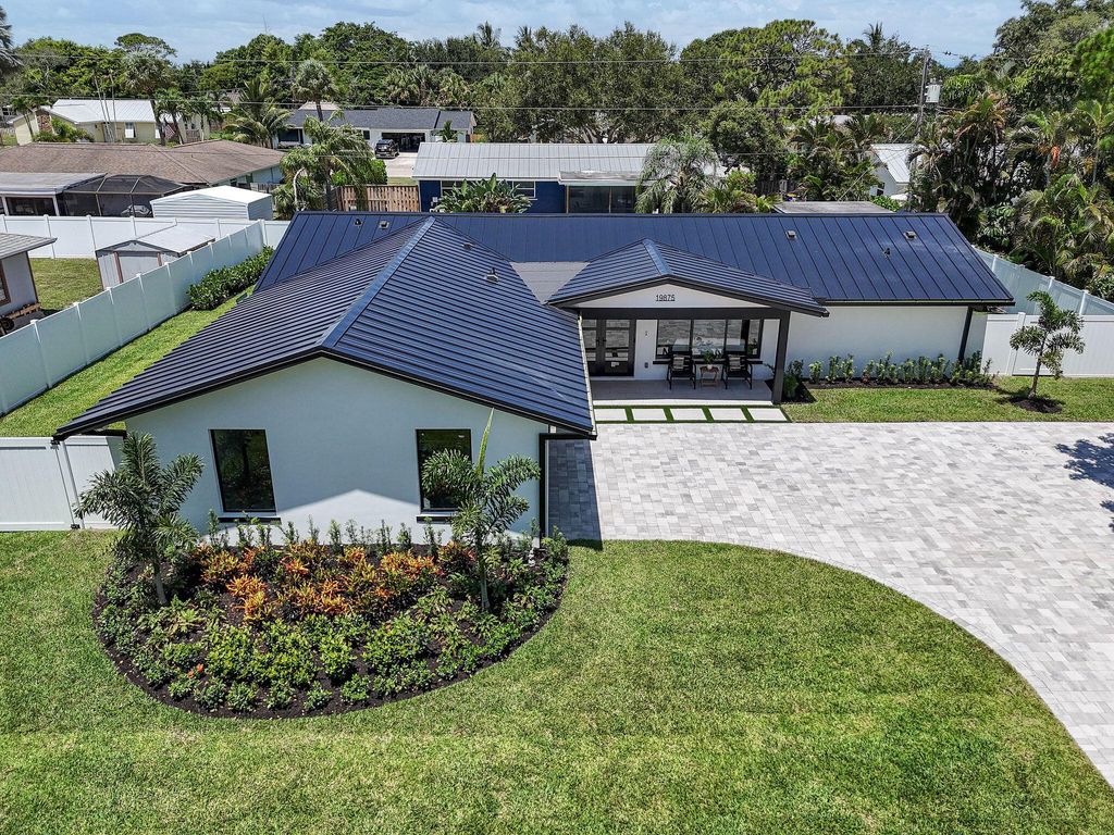 Photo of 19875 Hibiscus Drive, Jupiter, FL 33469 (MLS # R11107165)