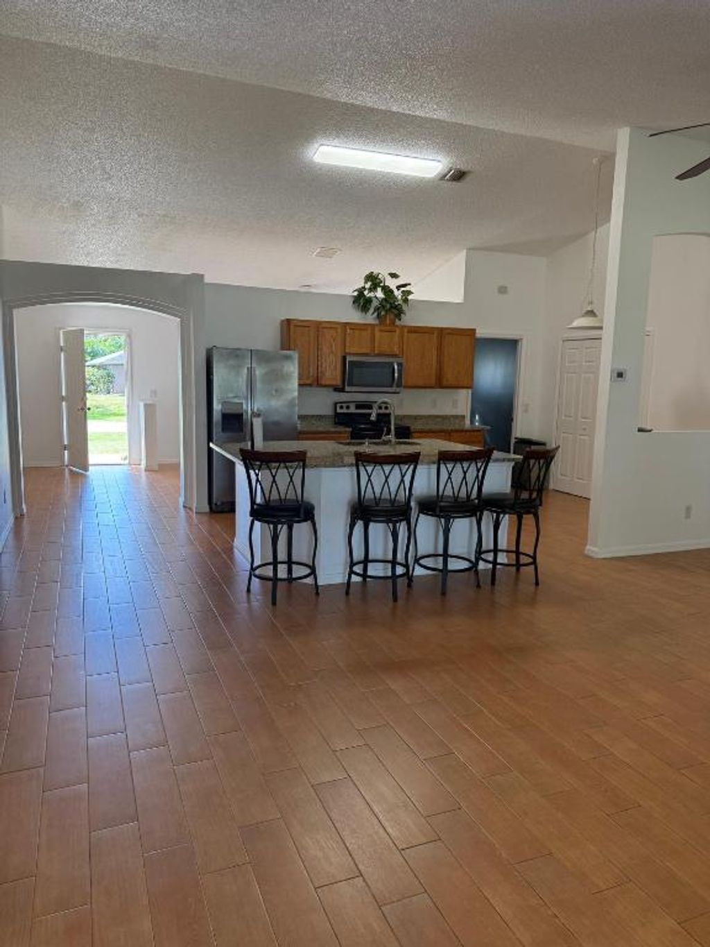 Photo of 1013 SW London Lane, Port Saint Lucie, FL 34953 (MLS # R11151490)