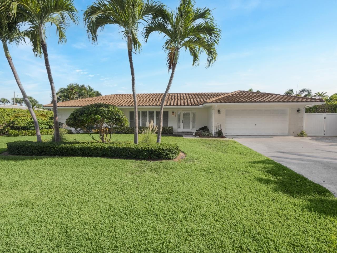 FOOTSTEPS AWAY TO WHITE SANDY BEACHES!! This stunning turnkey, furnished, split plan 3 bedrooms, 2.5 baths, 2 car garage home is just walking distance to the beach on Singer Island!! This luxurious home features include; gourmet kitchen with center island, granite countertops, stainless steel appliances, wood cabinetry with pass-through from kitchen to screened in pool area, porcelain 20'' tile floors throughout, plantation shutters, wood ceiling inserts with cove lighting in kitchen and master bedroom, walk in closets, master bathroom with jacuzzi tub, seamless glass shower, wood vanities and wood accent ceiling. The location is a short bike ride to John D. MacArthur beach state park, pickle ball, 5-star restaurants, shopping and only 15 miles to Palm Beach International airport