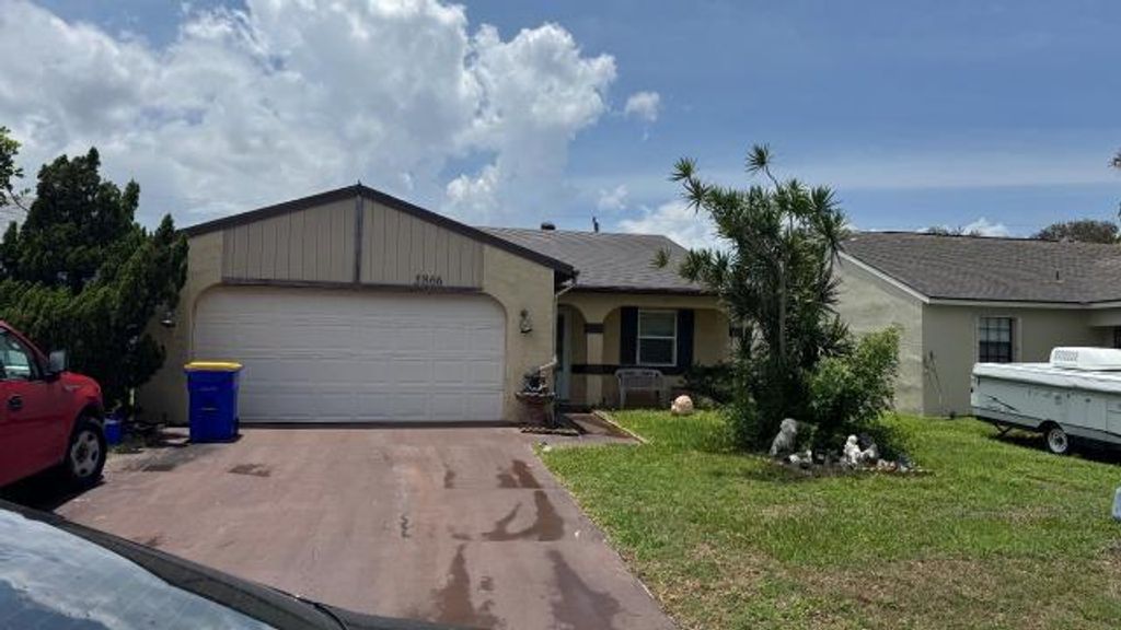 Photo of 5866 SE Mitzi Lane, Stuart, FL 34997 (MLS # F10512179)