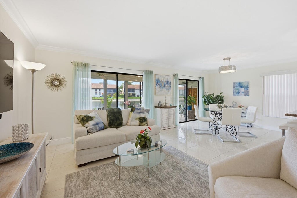 Photo of 10223 N CIRCLE LAKE Drive #102, Boynton Beach, FL 33437 (MLS # B26083076)