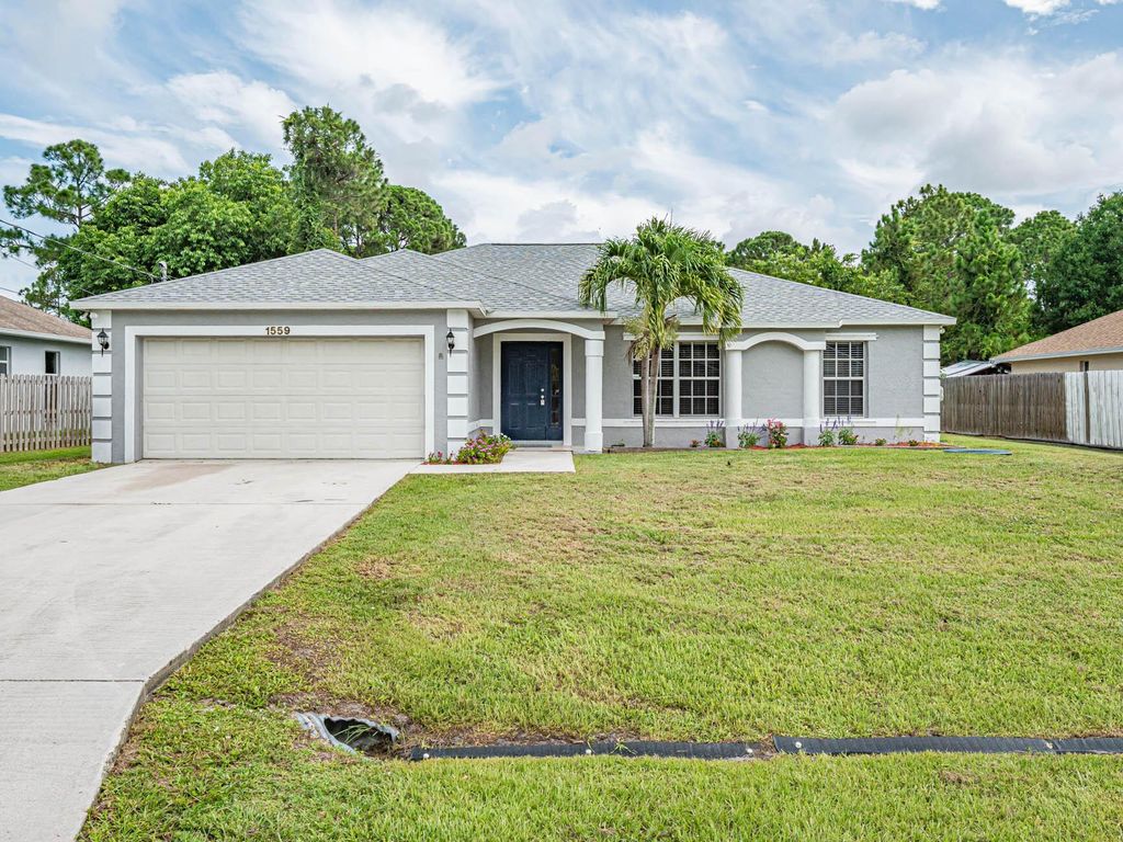 Photo of 1559 SW Hunnicut Avenue, Port St Lucie, FL 34953 (MLS # R10899801)