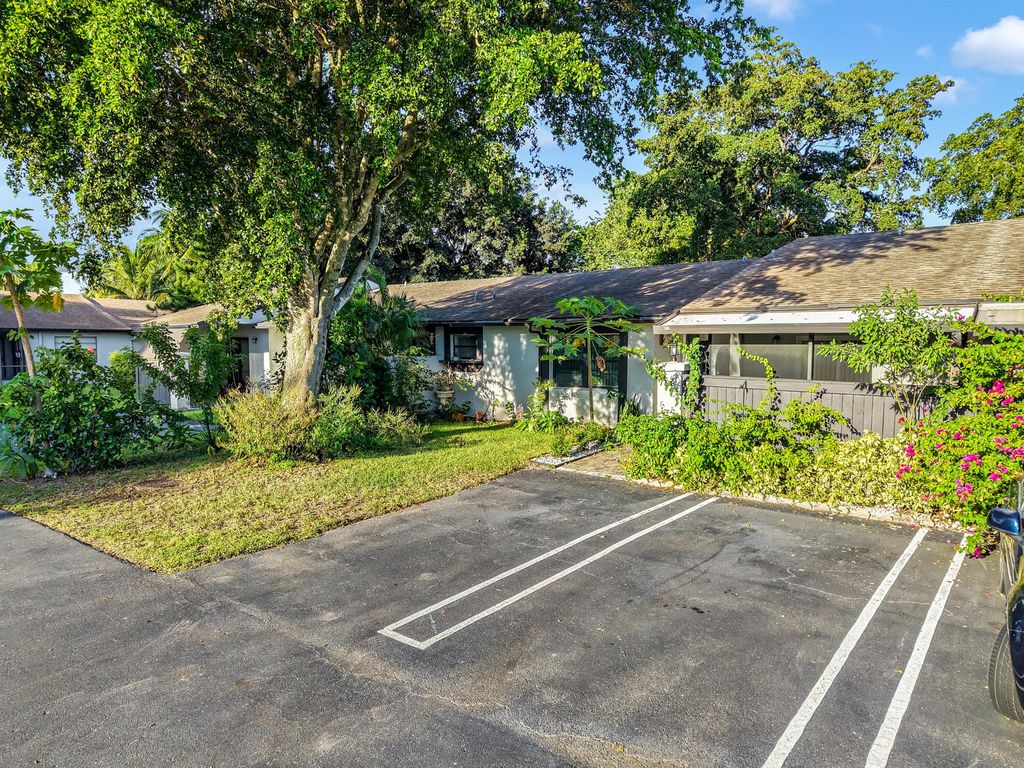 Photo of 77 Westecunk Drive, Royal Palm Beach, FL 33411 (MLS # R11118995)