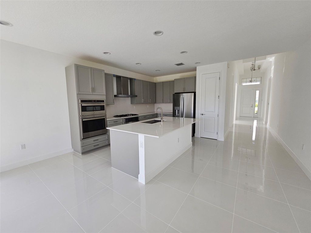 Photo of 1410 Thistle Place, Loxahatchee, FL 33470 (MLS # F10411109)