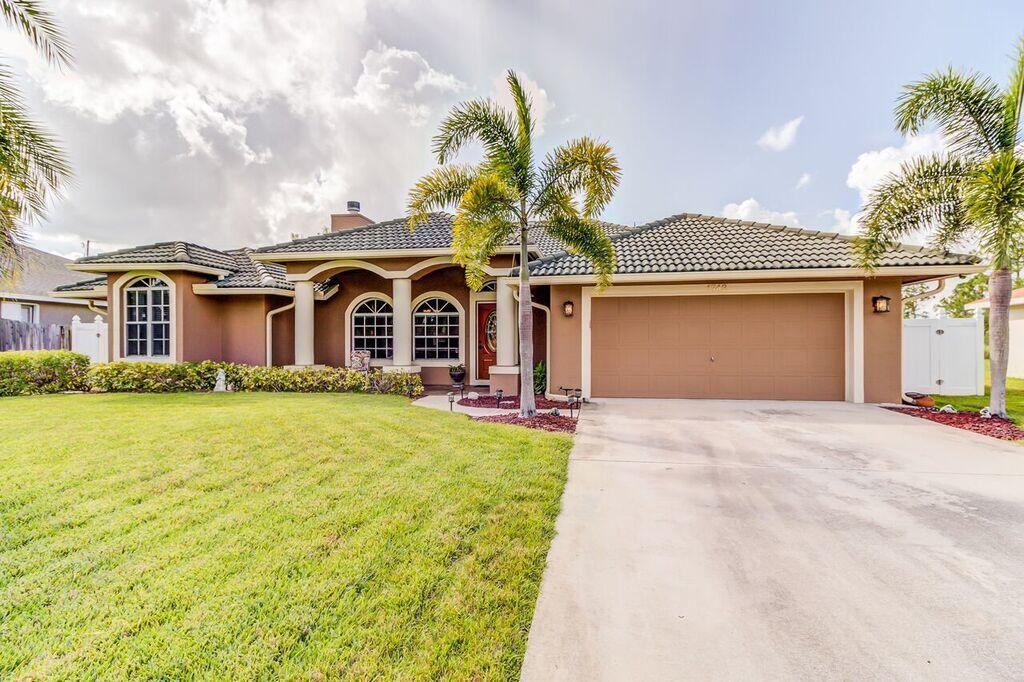 Photo of 1742 SW Commargo Street, Port Saint Lucie, FL 34987 (MLS # R10787028)