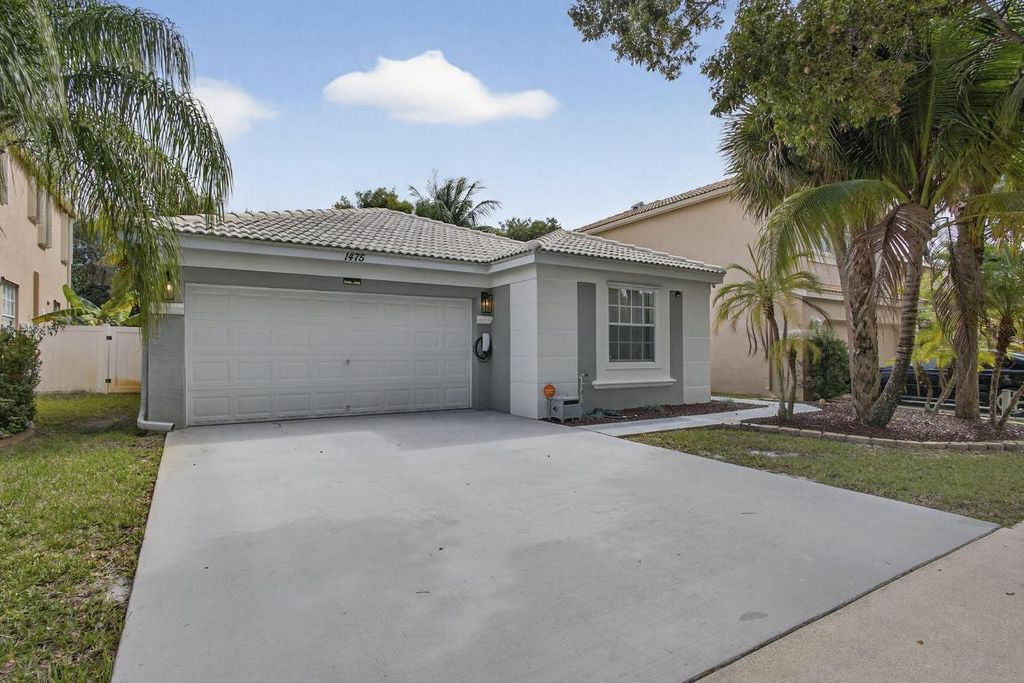 Photo of 1475 Running Oak Lane, Royal Palm Beach, FL 33411 (MLS # R11153305)