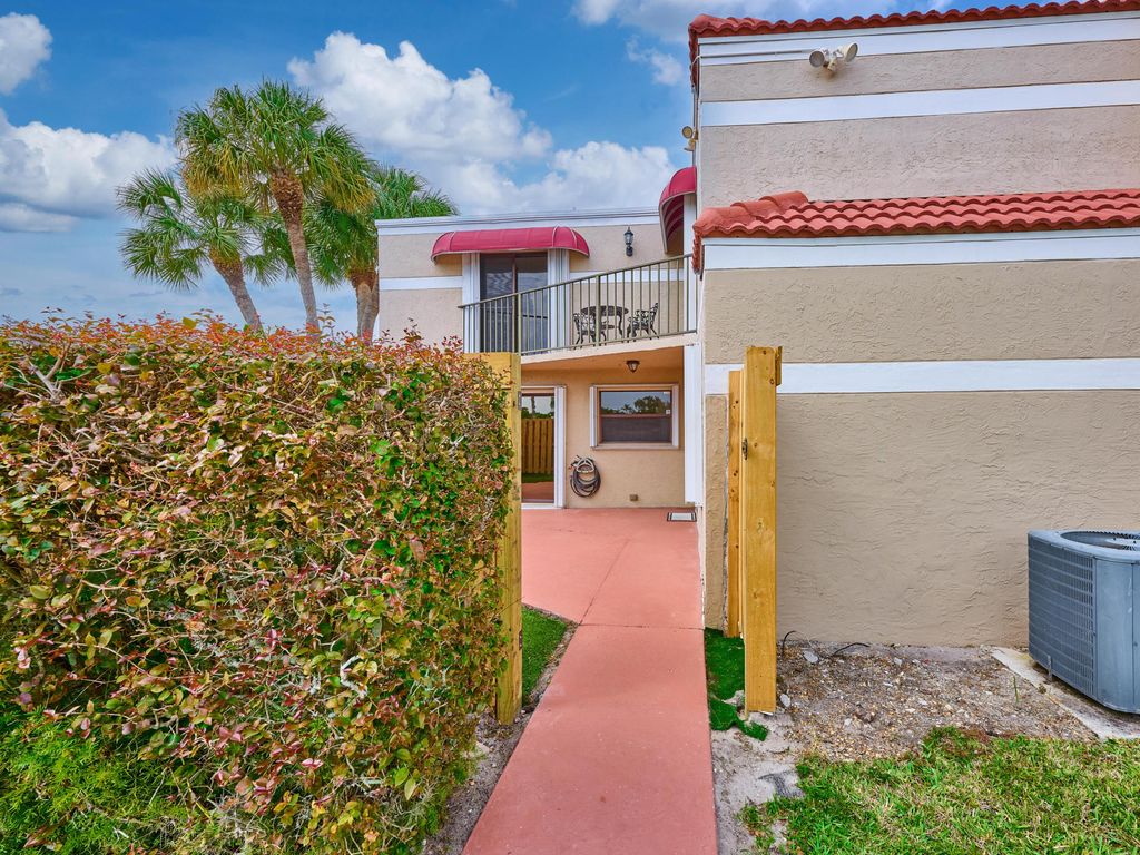 Photo of 4065 Village Drive #D, Delray Beach, FL 33445 (MLS # R11167319)