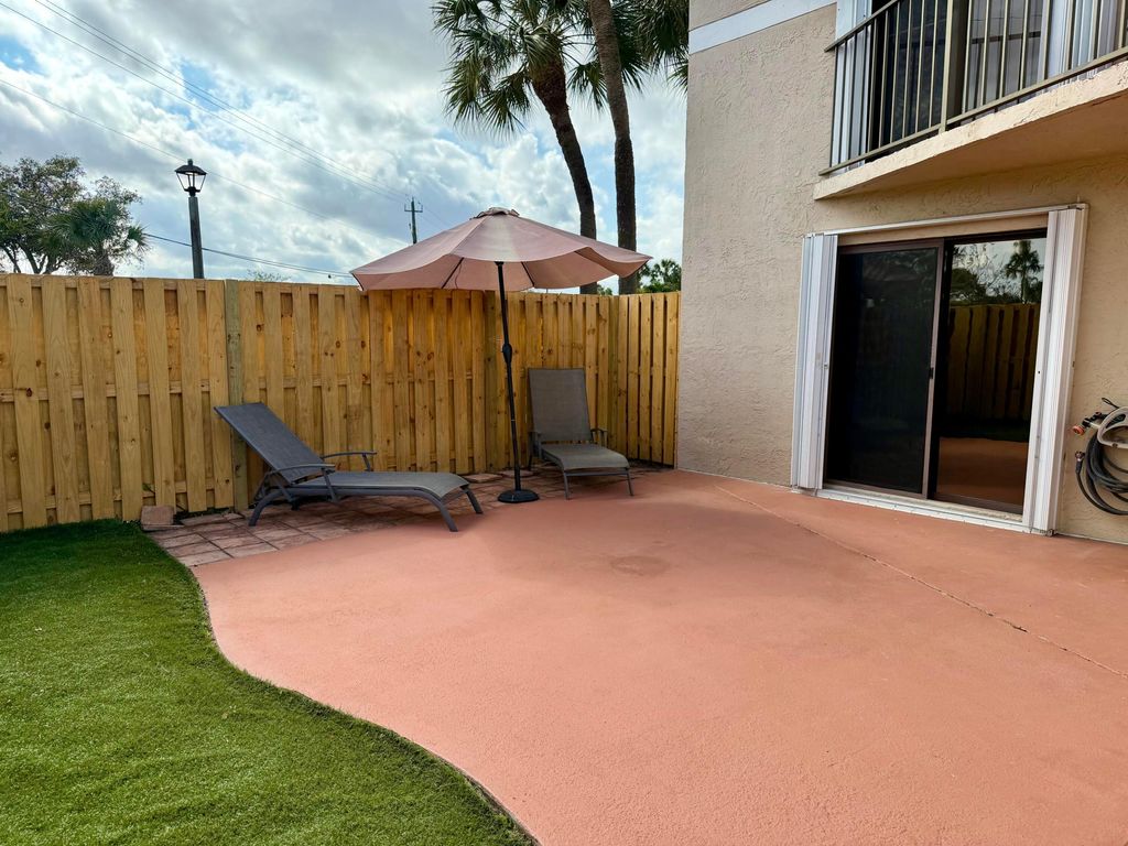 Photo of 4065 Village Drive #D, Delray Beach, FL 33445 (MLS # R11167319)