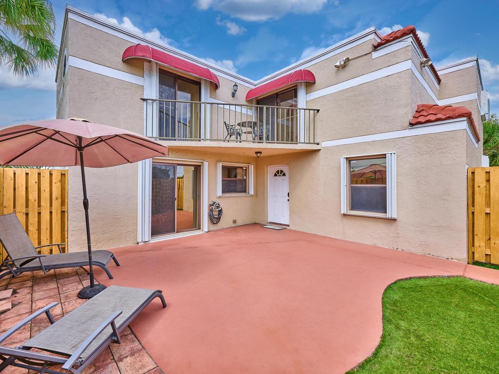 Photo of 4065 Village Drive #D, Delray Beach, FL 33445 (MLS # R11167319)