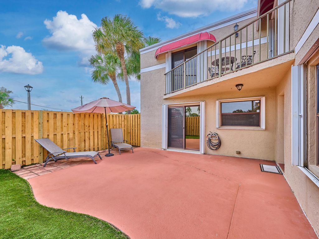 Photo of 4065 Village Drive #D, Delray Beach, FL 33445 (MLS # R11167319)
