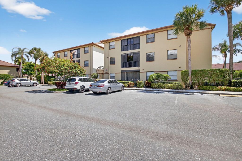 Photo of 5147 Europa Drive #W, Boynton Beach, FL 33437 (MLS # R11117669)