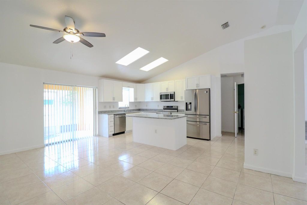 Photo of 3631 SW Kasin Street, Port Saint Lucie, FL 34953 (MLS # R10991205)