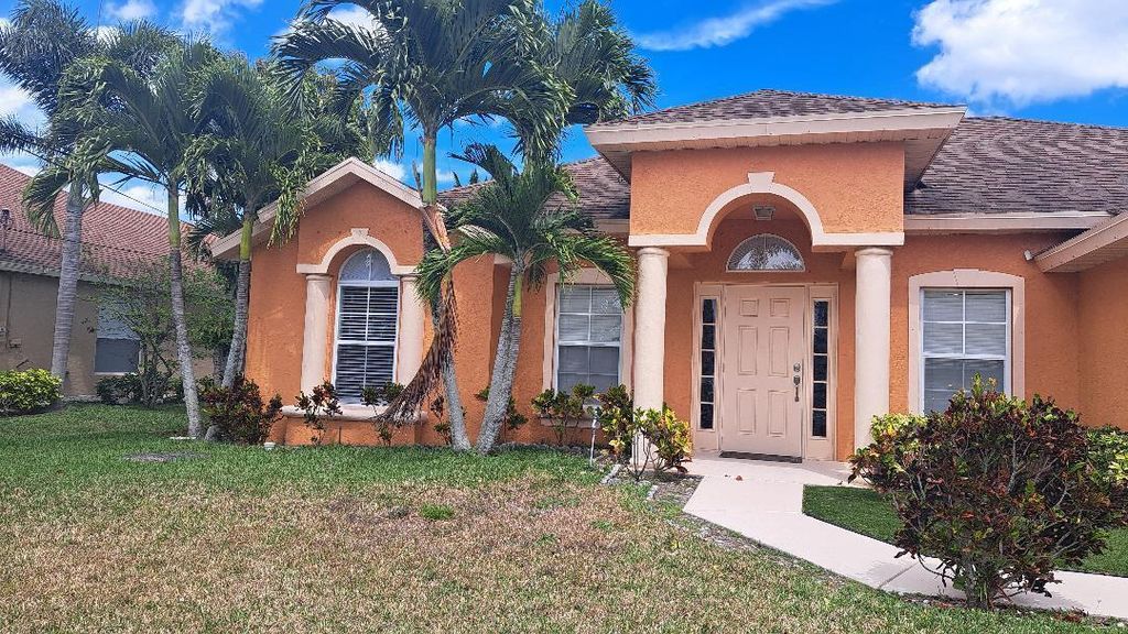 Photo of 3631 SW Kasin Street, Port Saint Lucie, FL 34953 (MLS # R10991205)