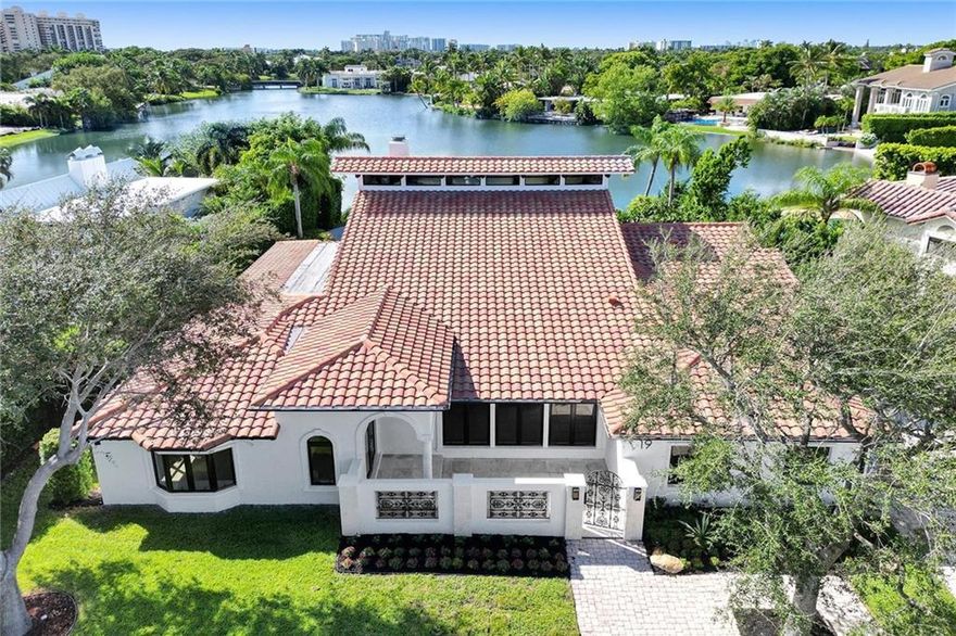 Accepting back-up offers. Move-in ready home on the LAKE in GATED SEA RANCH LAKES! Gorgeous, completely updated 5300+ sqft 6 bedroom with private Beach Club. Sitting on over 1/3 of an acre on the best location on Lake Seneca w/ long southern views, the home features exquisite NEW finishes such as Calacatta marble counters & 9.5" wide Oak floors throughout, high end faucets, sinks & hardware, dramatic primary suite w/lavish bath, water filtration system & RO, new double entry door, new A/Cs, iWave air ionization, new wireless alarm & 7 camera system. This masterpiece was custom designed & executed in detail, not to spec. Peaceful setting w/24hr security + walking distance to the Beach Club with heated pool, clubhouse & playground along 200' gorgeous beach. Minutes to the best schools.