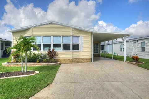 1217 Calusa Drive, Barefoot Bay, FL MLS: R11066691