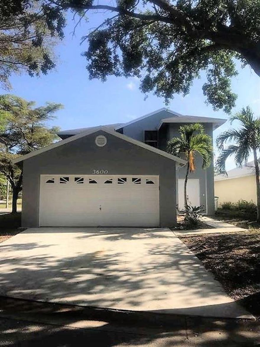 Beautiful modernized and just professionally painted Inside & Out with 10 yr warranty, this exceptional Family Home is move-in ready with a brand new custom built kitchen, new bamboo water resistant floors, newer AC and a host of great features like spacious open plan layout, new screened patio, massive private yard with serene lakefront view. This exclusive corner lot is situated in  popular Centura Parc, HOA includes Cable TV & Hi Speed Internet, 24 hour manned gate with patrols, great clubhouse with more amenities than we can list - gigantic Pool and Sun deck, Tennis courts, Ball court, fully equipped Fitness Center and the amazing Randazzo School located right in the community grounds. Do not miss the opportunity to move YOUR Family into this fantastic community