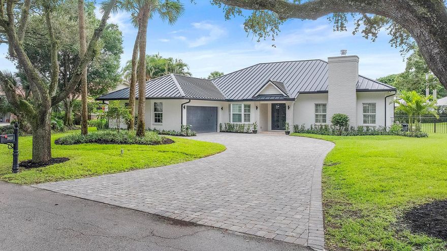 Located in the famously breathtaking oak tree lined riverside community Heritage Oaks in Tequesta, Fl. sits this completely remodeled 3,053 sq. ft. 4 bedroom/4.5 bath CBS construction pool home.  New 2025 metal roof.  All new bathrooms and closets. New kitchen, kitchen appliances, AC's, hot water heater.  Every inch of the home has been touched and updated.   Beautiful large fenced in back yard with refinished pool and spa.  Ideal location just minutes from the beach and all of the amazing dining and shopping that Jupiter has to offer.