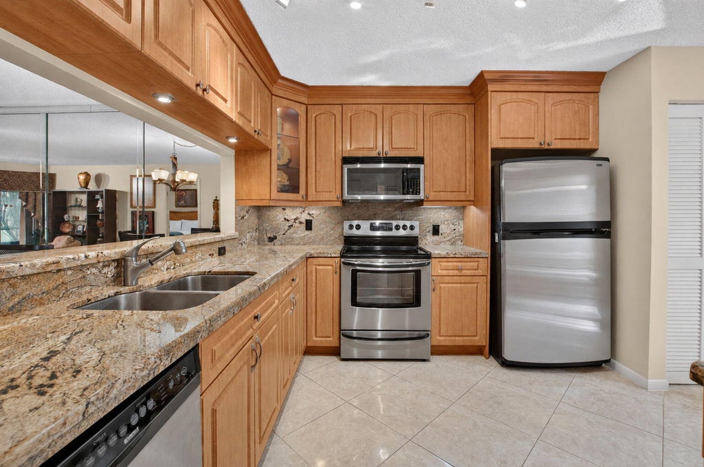 Photo of 16769 OAK HILL Trail #713, Delray Beach, FL 33484 (MLS # B26079601)