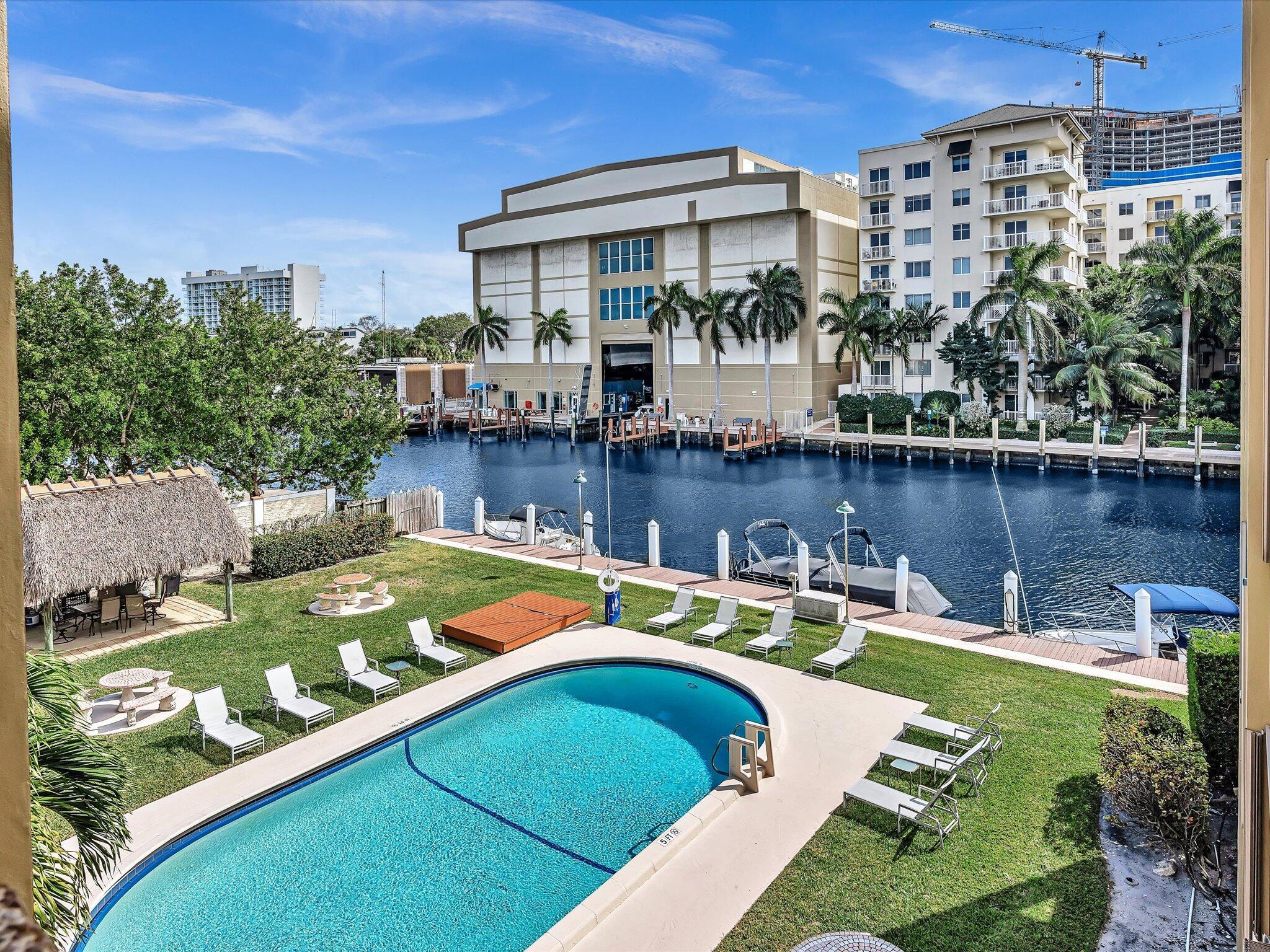 Caravel water front Condo offers the ultimate South Florida lifestyle. Wide canal with direct ocean access and dockage available on waitlist for boats up to 42ft. Storage for kayaks and paddle boards. New roof 2025, plumbing and elevator updates complete, assessment paid for, reserves fully funded. Enjoy the pool, tiki hut with grill, and renovated hallways. Oversized one bedroom with granite counters, stainless steel appliances, tile floors, and plenty of closet space. Lease after one year, 90 day minimum. Walk or bike to 15th Street Fisheries, Lauderdale Marina, beaches, Las Olas, and shopping. This is waterfront living at its best.