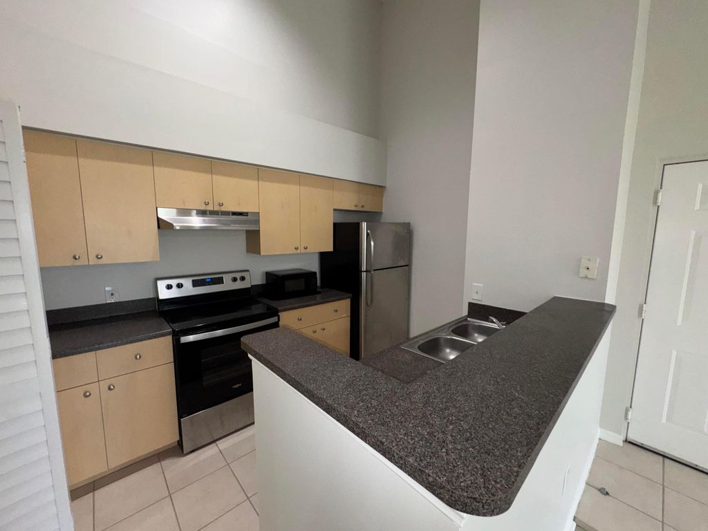 Photo of 4115 San Marino Boulevard #306, West Palm Beach, FL 33409 (MLS # R11153868)