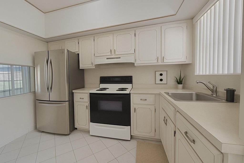 Photo of 3051 Sunrise Lakes Dr #203, Fort Lauderdale, FL 33322 (MLS # F10539943)