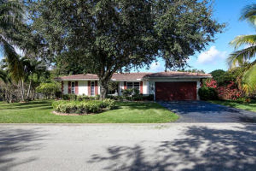 WOW! 3 BED / 2 BATH POOL HOME WITH 2 CAR GARAGE IN PRESTIGIOUS CORAL SPRINGS. LARGE OPEN KITCHEN WITH WOOD CABINETS, NEWER APPLIANCES, NEWER ELECTRIC PANEL, NEW ROOF IN 2005,POOL,FENCE, HURRICANE SHUTTERS, FENCED YARD WITH LAVISH LANDSCAPE AND FRUIT TREE'S, SPRINKLERS, SCREENED PATIO, CLOSE TO SCHOOLS,SHOPPING AND DINING. MUST SEE!