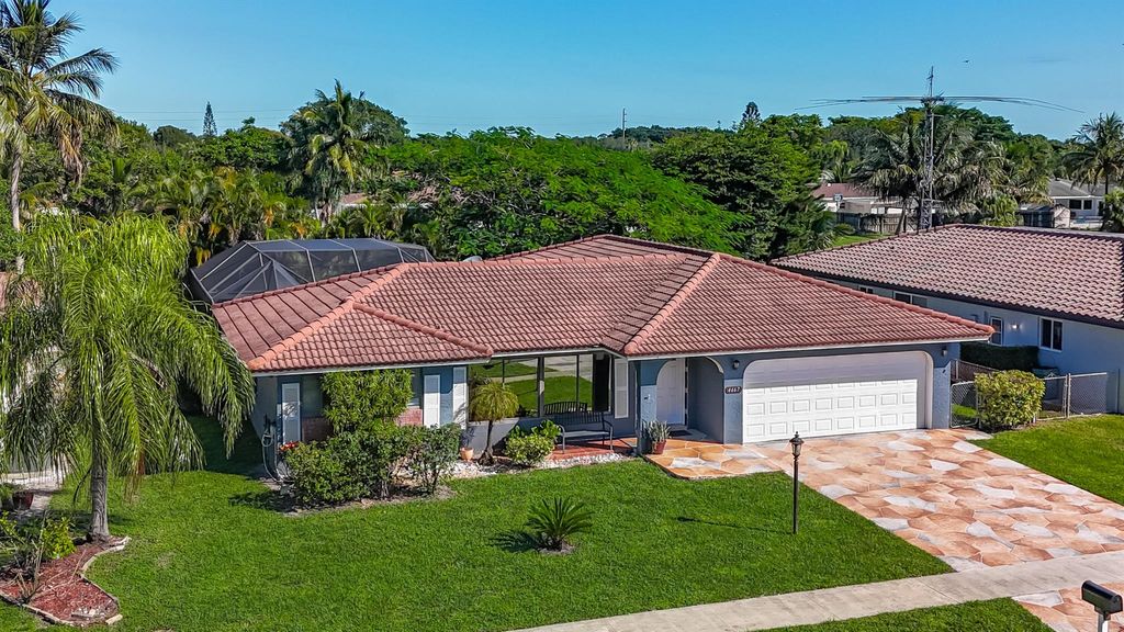 Photo of 4667 Baldric Street, Boca Raton, FL 33428 (MLS # R11134293)