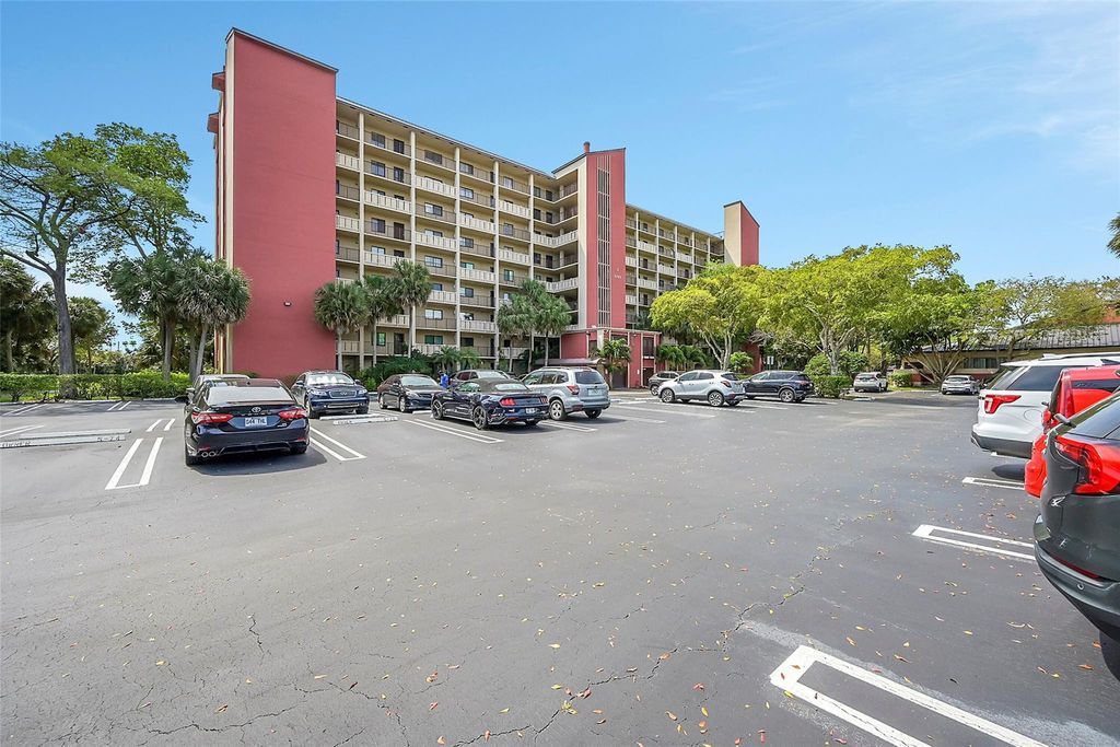 Photo of 2202 S Cypress Bend Drive #104, Pompano Beach, FL 33069 (MLS # F10493696)