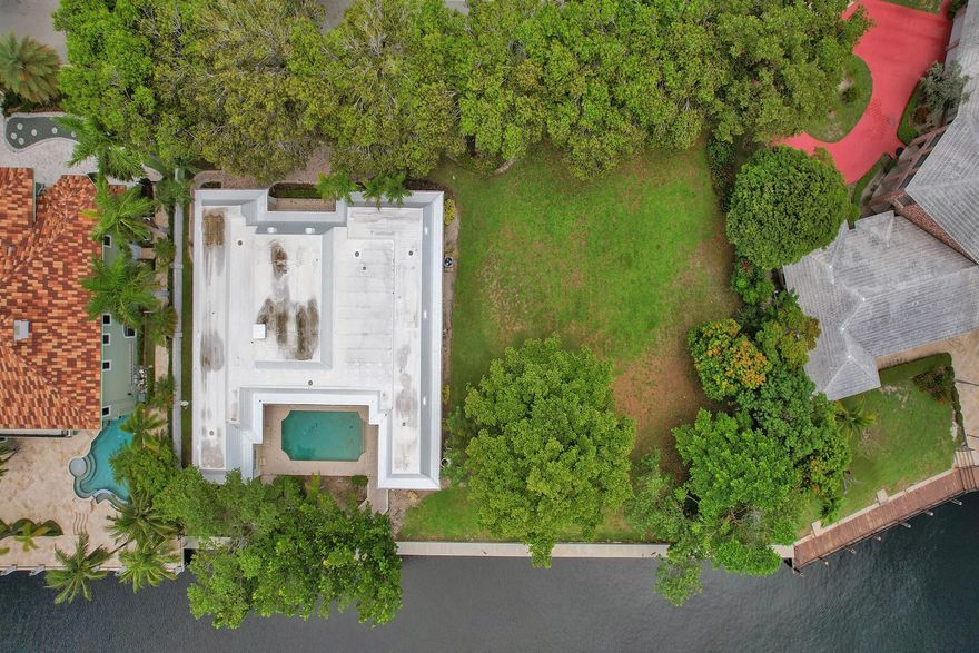 This property currently has a 4200sf house on the lot.  Combine this lot with the lot nextdoor to have over 25,000sf with approximately 214ft of waterfront in exclusive Bay Colony.  2 separate folio numbers. Same owner.  Build your mansion and dock you mega yacht!  Minutes to Fort Lauderdale and Lauderdale By The Sea beaches and Las Olas. Guard gated community with security patrol.  Incredible opportunity! See separate listing for house and lot:  F10386120 and F10386309