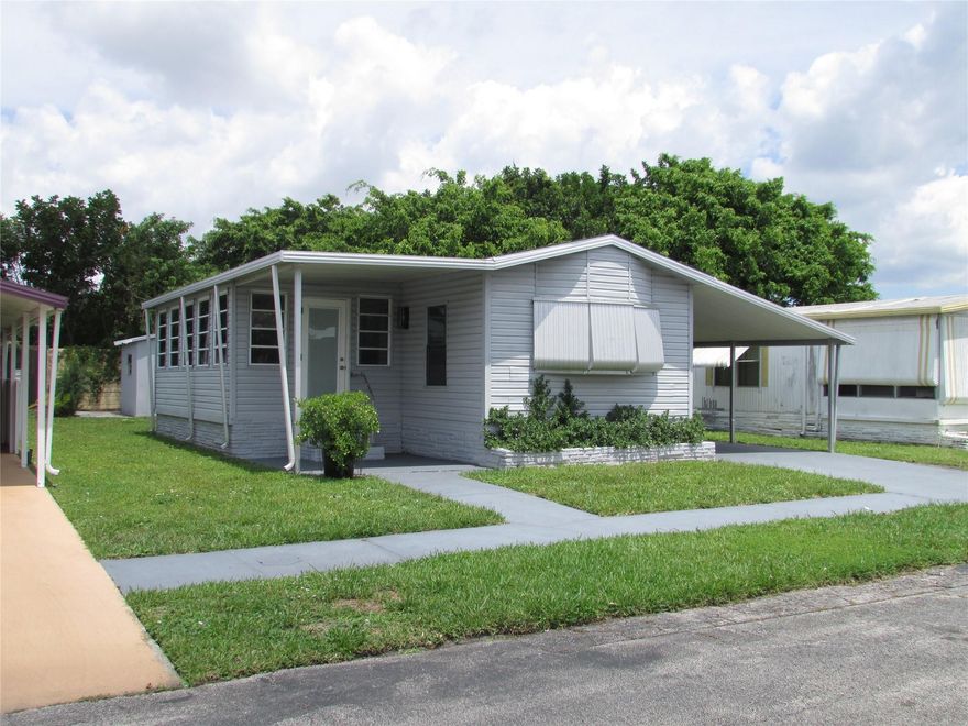 SINGLE WIDE MANUFACTURED HOME LOCATED IN AN ADULT (55+), GATED COMMUNITY. THIS HOME OFFERS AN UPDATED KITCHEN WITH SNACK BAR, OPEN FLOOR PLAN, PRIVATE PATIO OASIS IN THE BACKYARD.  TOTALLY FURNISHED, AVAILABLE FOR SEASONAL RENTAL.  COMMUNITY OFFERS CLUBHOUSE, HEATED POOL, TENNIS, PICKLE BALL, AND SOCIAL ACTIVITIES.