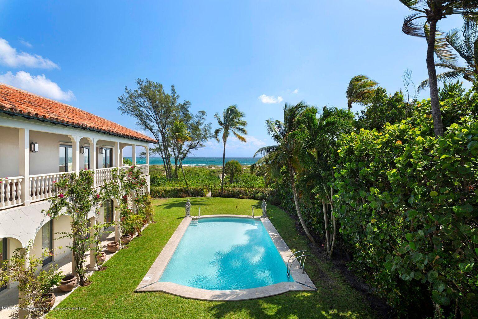 Direct Oceanfront North End Dunes Estate. Situated on over 1.8 acres with expansive sand dunes leading to the widest and most private beach on the Island. This captivating European villa features a wrap-around covered lanai and balconies for a total of 12,928 square feet. Renovate or build new on this rare waterfront property.