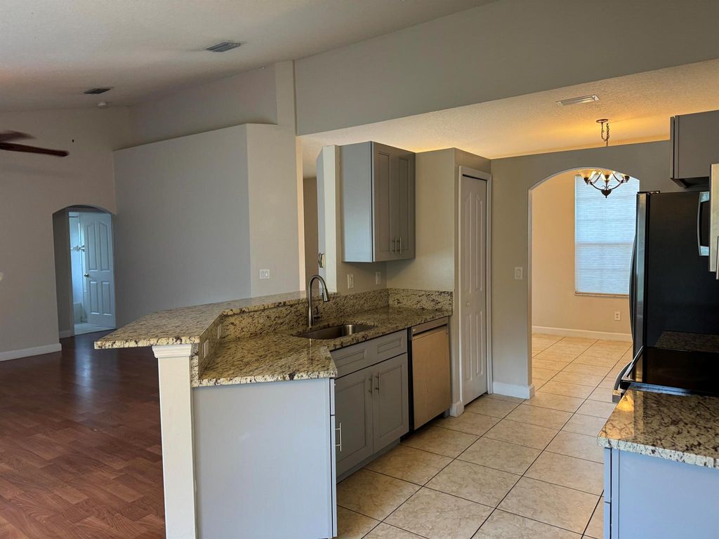 Photo of 1781 SW Fortune Road, Port Saint Lucie, FL 34953 (MLS # R11043945)