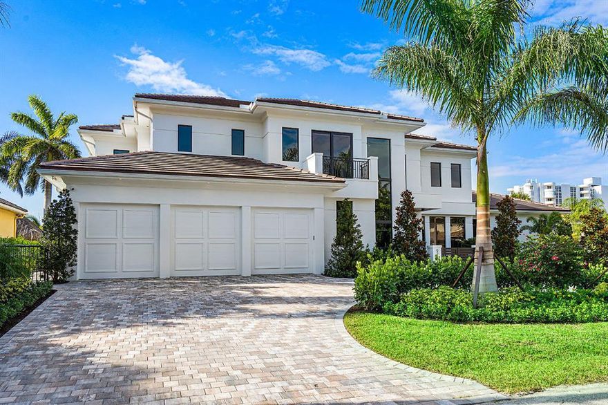 Brand New, Coastal Contemporary Waterfront Estate with 130 feet of protected deepwater, one lot off the Intracoastal on a cul-de-sac street in Tropic Isle, Delray Beach.  
This stately home with commanding water views offers five bedrooms, seven baths, a three car garage, an elevator, and a resort style pool and loggia. The home was custom built to the highest quality standards, with detailed craftsmanship and luxury amenities.  Highlights include a traditional great room floor plan with detailed mill work, wide-plank distressed oak floors, and floor to ceiling windows and doors offering a seamless flow between indoor and outdoor living. The main level includes an impressive club room lounge, an elegant master suite, and spacious home office. The second level includes four en-suite bedrooms and a bonus room all with outdoor access to the upper balcony. The backyard offers a true tropical paradise with outdoor kitchen, salt water pool, spa and sun shelf all overlooking beautiful blue water.