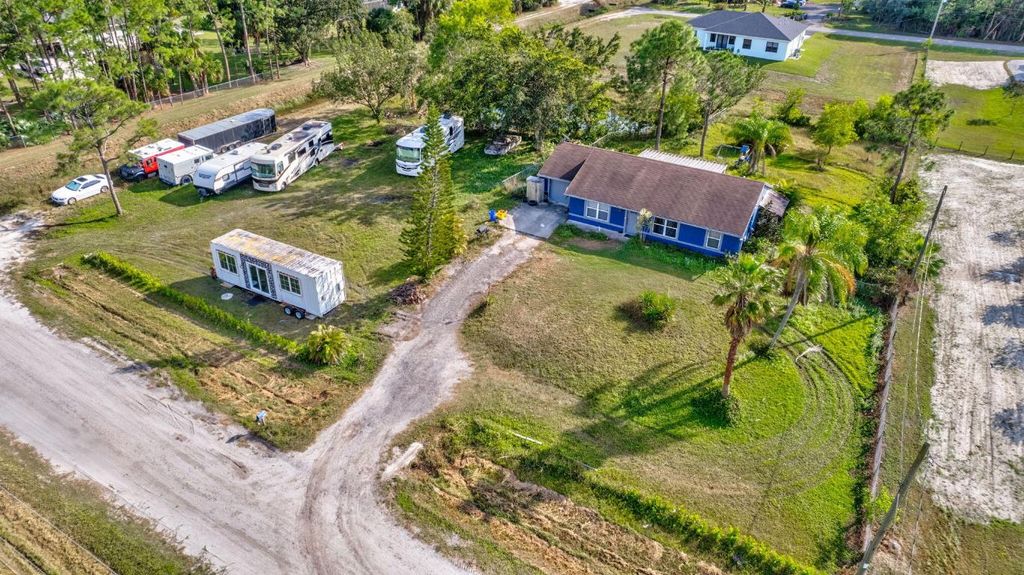 Photo of 18268 91st Place N, The Acreage, FL 33470 (MLS # R11153036)