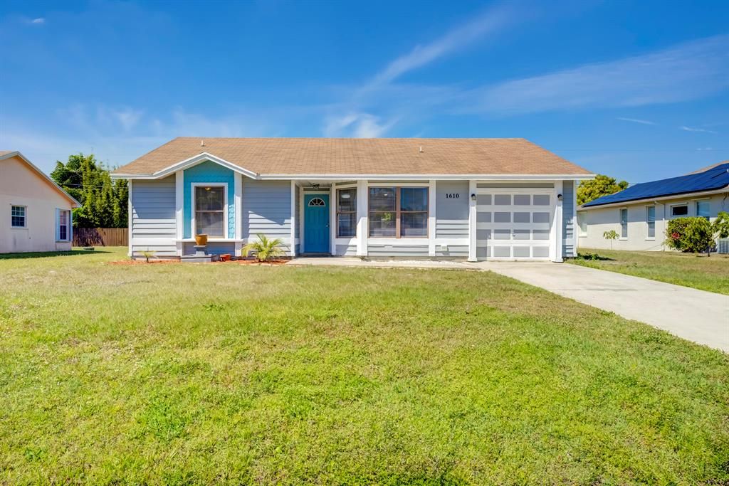 Photo of 1610 SE Ridgewood Street SE, Port St Lucie, FL 34952 (MLS # R10875144)