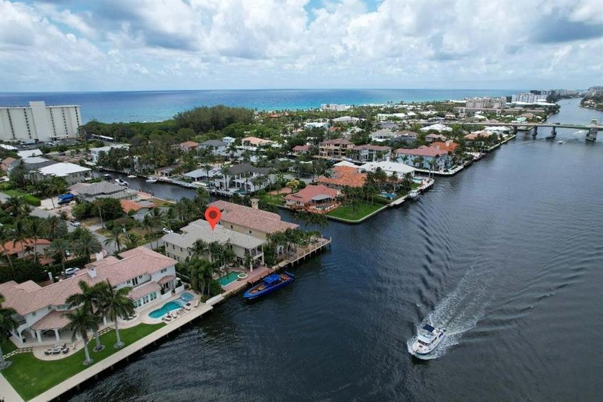 Intracoastal Front Home in a NO Wake Zone in Beautiful Delray Beach off of Ocean Blvd. Have your boat in the back and walk to the beach from the front! This exquisite 5bedroom 5bath home will captivate you from the moment you walk through the grand double door entry into the open foyer and formal living room with expansive views of the Intracoastal! This home has elegant marble flooring and beautiful stone fireplace along with chef inspired kitchen off of the family room all with water views. Outside the family room is a covered loggia with summer kitchen alongside the saltwater pool and spa. There is a guest suite on the first floor and two walkout covered balconies from the master suite and guest bedroom upstairs. This is a perfect home for a family and  entertaining. Magnificent Intracoastal Front Home in Beautiful Delray Beach off of Ocean Blvd. Park your boat in the back and walk to the beach from the front! This exquisite 5bedroom 5bath home will captivate you from the moment you walk through the grand double door entry into the foyer and formal living room with expansive views of the Intracoastal! This home has elegant marble flooring and beautiful stone fireplace along with a chef inspired kitchen off the family room all with water views. Outside the family room under the covered loggia there is a summer kitchen alongside the saltwater pool and spa. There is a Library/Den along with a guest suite on the first floor and a loft on the second floor that opens up to the formal living room below. The master suite and guest suite both have covered open balconies. This is a perfect home for a family and entertaining!