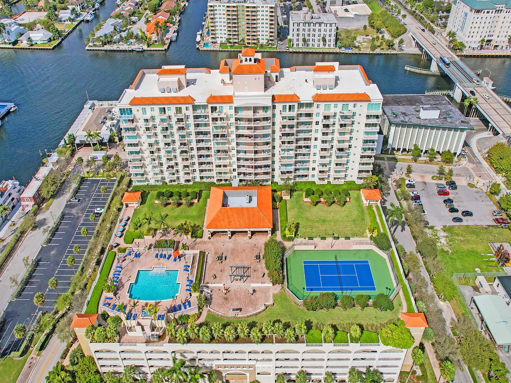 If you act fast we may be able to have you in to your new homes at the Tides at Bridgeside Square with the most incredible seat for the Fort Lauderdale Boat Parade. If you miss it this year, we can assure you 2024 you will have the most coveted seat in town on this huge double balcony looking over the intracoastal waterway. Beautiful large one bedroom with a newer kitchen, newer appliances. Full size washer and dryer. CABLE and INTERNET INCLUDED. The double balcony has access from both the living area and the bedroom. Marble floors throughout main living area and bathroom, brand new wood floors in bedroom. Huge walk-in closet. Incredible building workout facility, tennis court, beautiful pool deck with hot tub, club house, business center, BBQ grills. TWO GARAGE PARKING SPOTS INCLUED