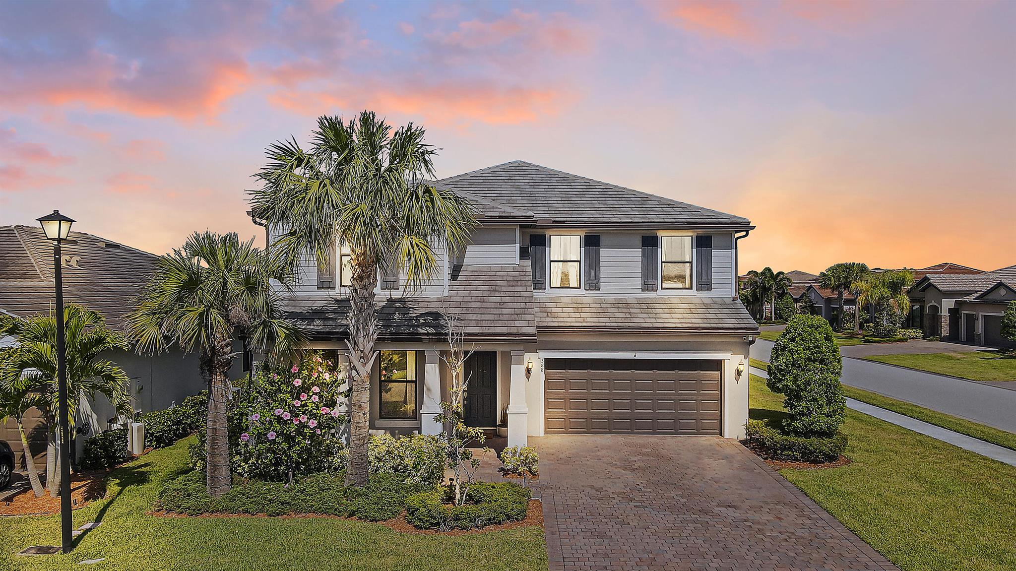 Welcome to 388 SE Courances Drive, a breathtaking 2019-built home that seamlessly blends luxury, comfort, and modern style. With 3,223 sq ft of thoughtfully designed living space, this expansive four-bedroom, three-and-a-half-bathroom residence is perfect for families who seek both space and elegance. Upon entering, you'll be greeted by a versatile den, ideal for a home office, study, or playroom, while the large, open living area has been expanded for effortless entertaining.The chef-inspired kitchen serves as the heart of the home, boasting an oversized island, stainless steel appliances, and an abundance of high-hat lighting. Whether preparing a family meal or hosting friends, this kitchen creates an inviting atmosphere that flows seamlessly into the spacious living room.