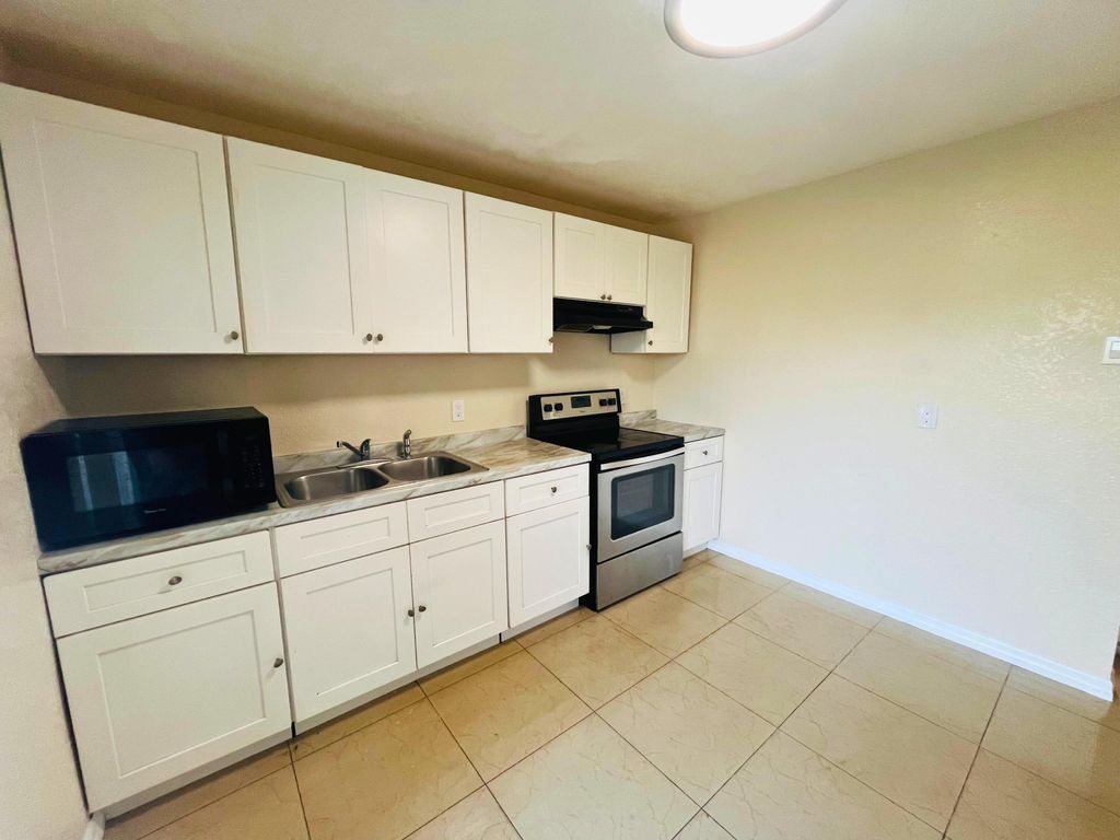 Photo of 3029 Martin Avenue #3029, Greenacres, FL 33463 (MLS # R11145671)