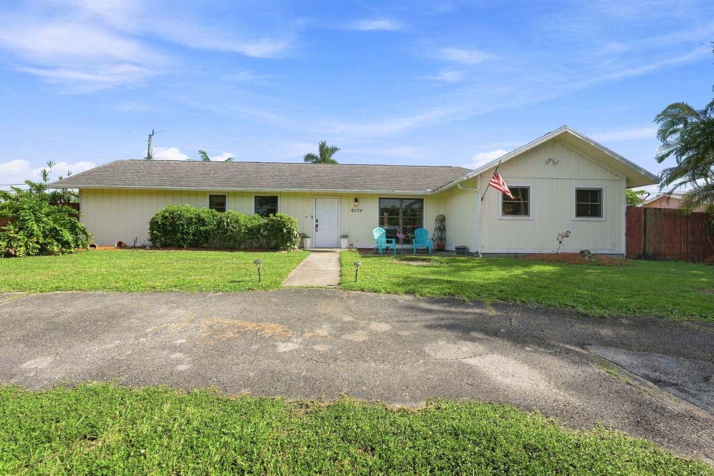 Photo of 9179 Honeywell Road, Lake Worth, FL 33467 (MLS # B26066446)