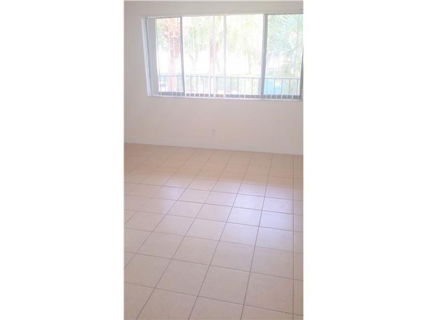 GATED COMMUNITY, CLOSE TO SHOPS, SECOND FLOOR COMPLETELY TILED UNIT, SPACIOUS BEDROOMS WITH WALK IN CLOSETS AND ACCESS TO SCREENED IN BALCONY. FULL SIZE WASHER AND DRYER AND LOTS OF STORAGE SPACE. HURRY WON'T LAST.