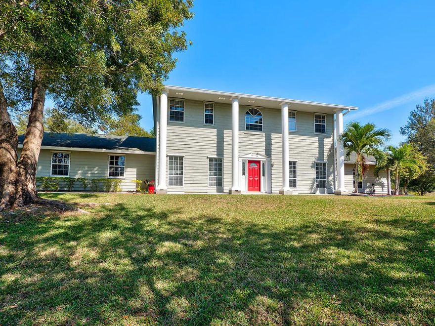 Fabulous 1.29 acre property! This huge yard is fenced, landscaped and equipped with sprinklers. A beautiful home inside and out! Bright great room is the perfect gathering area, with stone accented gas fireplace & mantel. Large formal dining room with plantation shutters, crown & chair molding. Formal living also has plantation shutters and is bright & spacious. Kitchen has stainless steel appliances and plenty of cabinet space. Ground floor master bedroom with sitting area, walk in closet, master bath with double vanity, separate tub & shower. Three secondary bedrooms, plus loft are upstairs. 4th bedroom is HUGE and could be a theater room. Storage, shed, dog run, 2014 water system, 2015 water heater. Plenty of space on this lot for boats, cars and RV (RV hookup) Home Warranty at closing