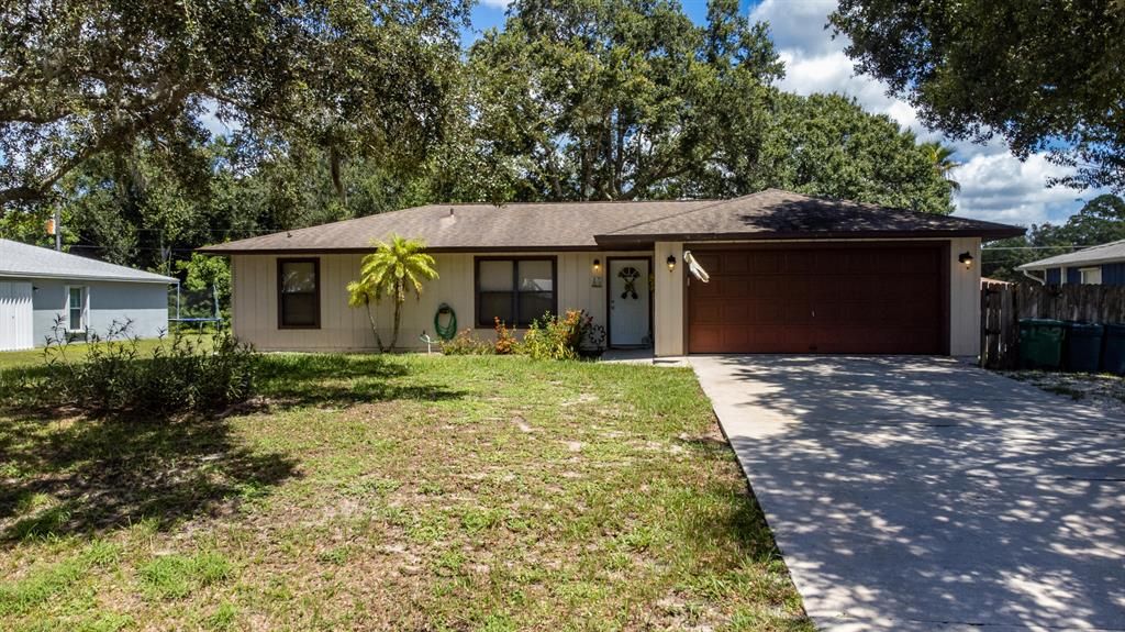 Photo of 7506 Coquina Avenue Ave, Fort Pierce, FL 34951 (MLS # R10826654)
