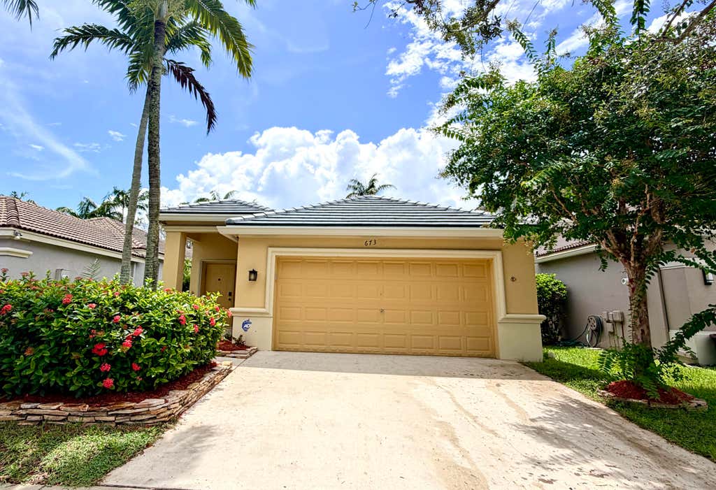 Photo of 673 CONSERVATION Drive, Weston, FL 33327 (MLS # B26058160)