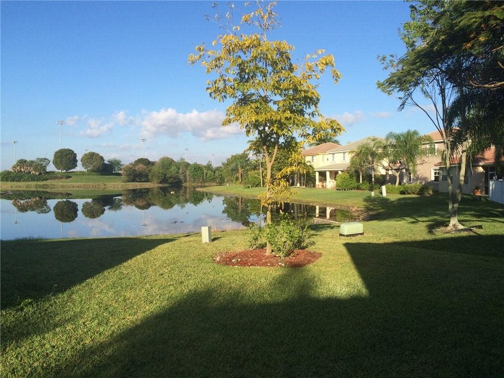 Photo of 673 CONSERVATION Drive, Weston, FL 33327 (MLS # B26058160)