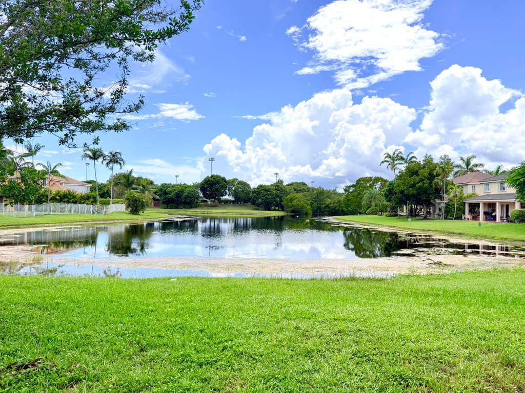 Photo of 673 CONSERVATION Drive, Weston, FL 33327 (MLS # B26058160)