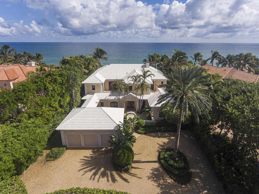 Directly fronting 100+/- feet on the ocean and stretching 400+/- feet deep, this privately walled, fenced, and gated estate is nestled on the wide, dune-fringed sands right across from the Gulf Stream Golf Club.  Tall hedges, stately palms, and other lush tropical trees create an established estate setting.  Through an archway from the winding drive, a lovely courtyard highlights the entrance to the residence.  Verandahs stretch across both levels of the ocean side, served by a cabana bath, stepping down to the heated pool, with a dune crossover behind the hedged lawns.***SEE SUPPLEMENT***