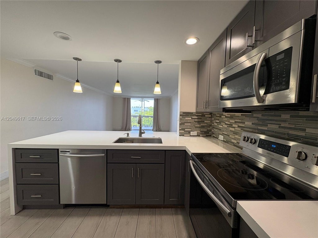 Photo of 900 NE 12th Avenue #703, Hallandale Beach, FL 33009 (MLS # A12049617)