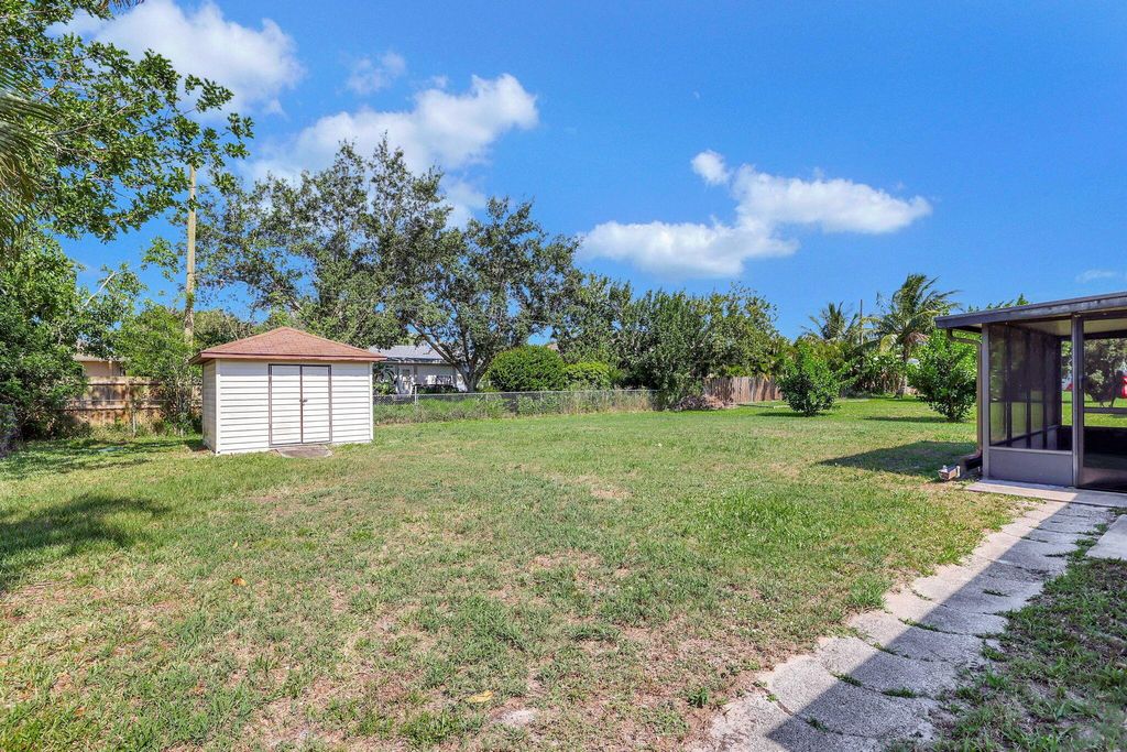 Photo of 2433 SE Warwick Street, Port Saint Lucie, FL 34984 (MLS # R10990190)